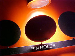 Pin Holes for Leak Testing and Calibration