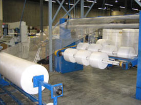 Slitting and Rewinding numerous rolls of netting